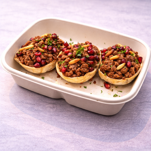 Minced beef Fatteh cups with pomegranate molasses and pine nuts